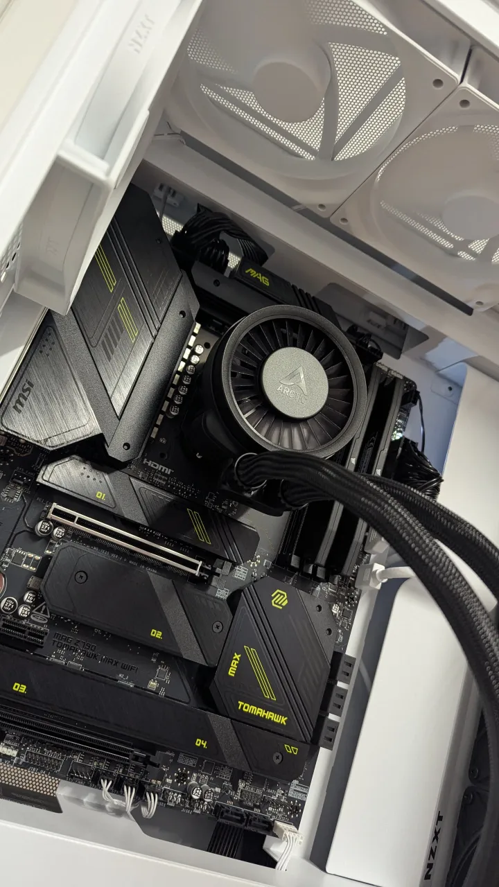 A liquid-cooled CPU on an MSI Tomahawk motherboard
